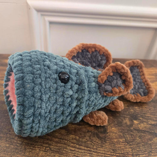 Crochet Bass Fish Plush Toy: Amigurumi Stuffed Animal with Pocket Mouth.