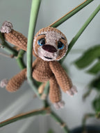 Handmade Crochet Sloth Plush: Soft Chenille Amigurumi Stuffed Animal for Sloth Lovers.