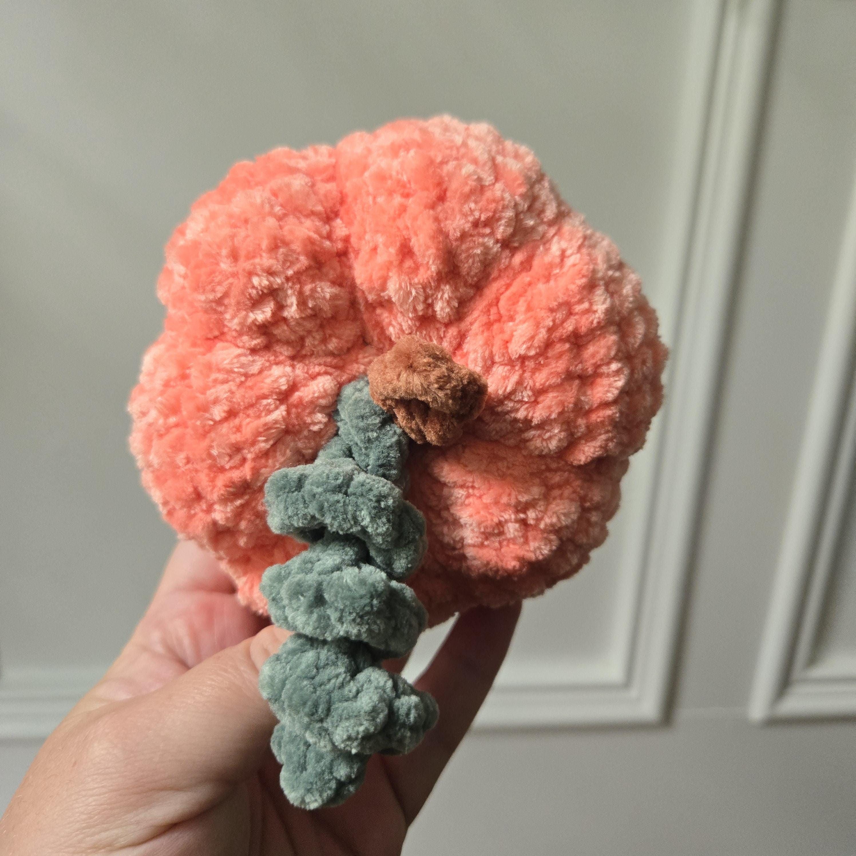 Handmade Crochet Pumpkin Plush: Amigurumi Fall Decor Toy.