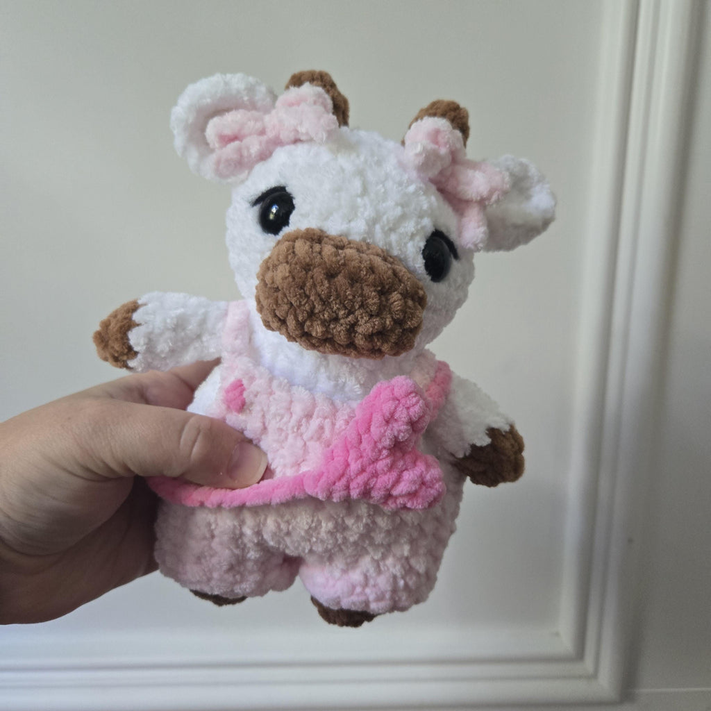 Handmade Crochet Cow Plush with Pink Overalls and Heart Bag – Amigurumi Toy
