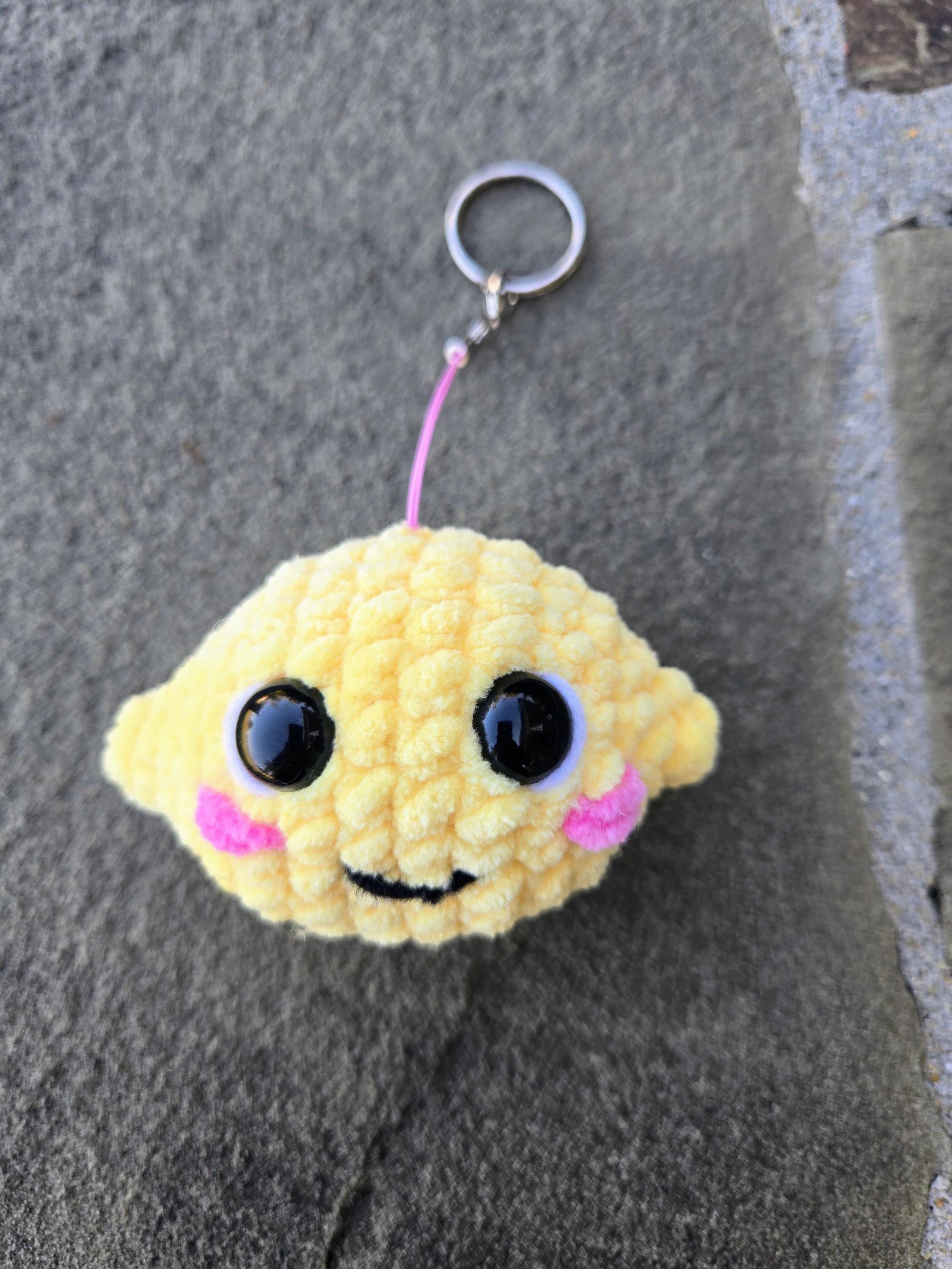 Crocheted Lemon Keychain Plush – Handmade Amigurumi Citrus Fruit Charm Accessory.