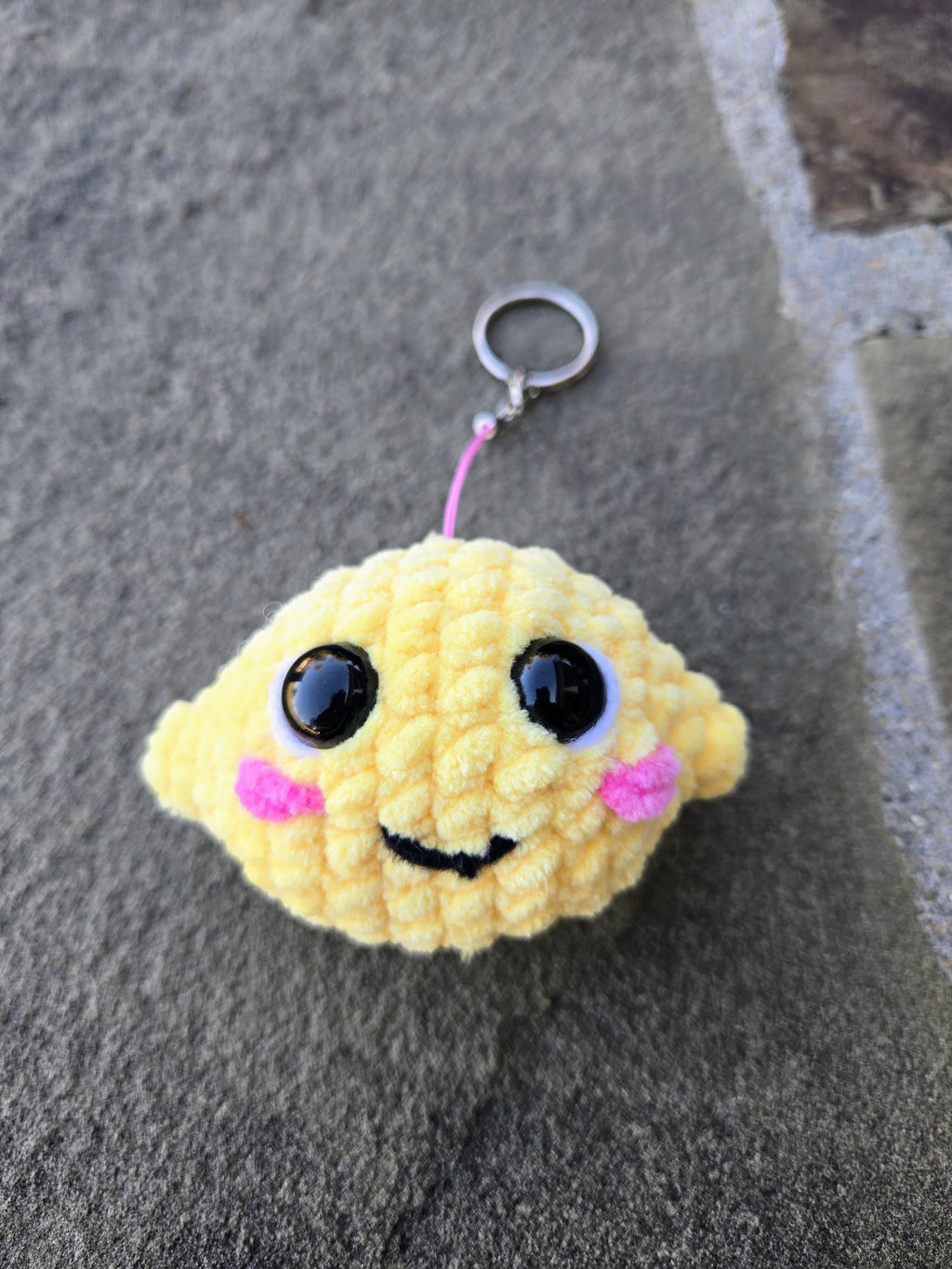 Crocheted Lemon Keychain Plush – Handmade Amigurumi Citrus Fruit Charm Accessory.