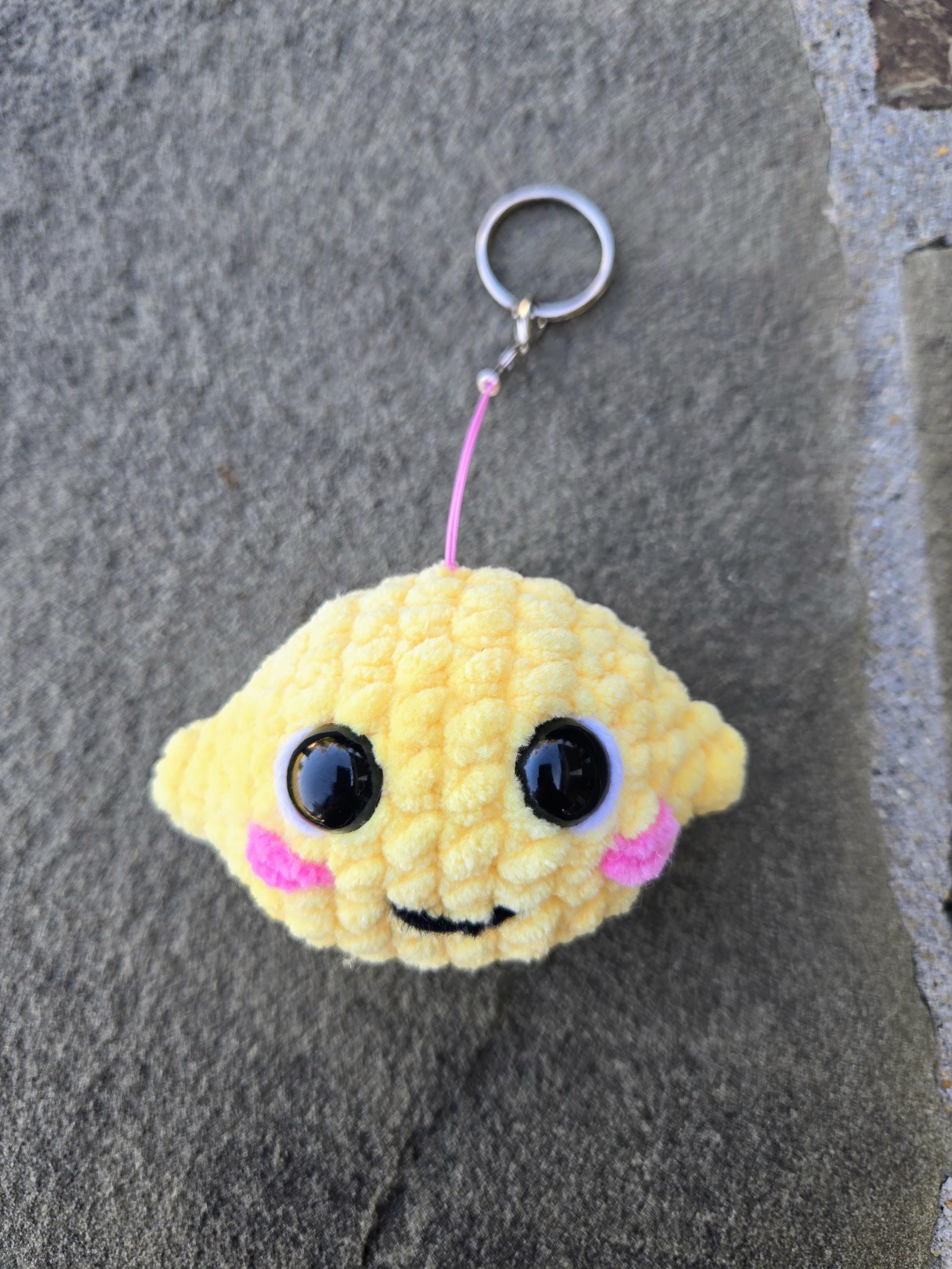 Crocheted Lemon Keychain Plush – Handmade Amigurumi Citrus Fruit Charm Accessory.